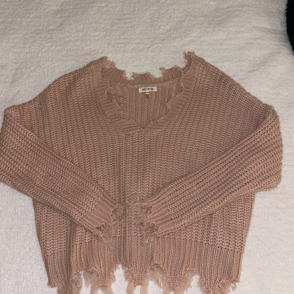 Pink distressed sweater